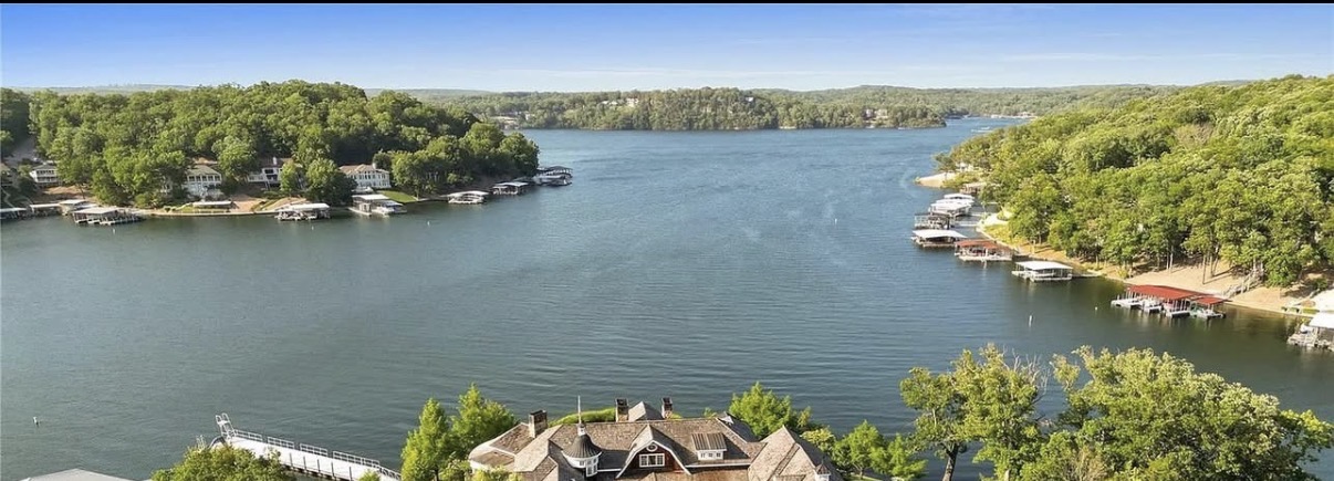Homes along a wooded lakeshore